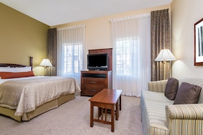 Relax on the comfy bed after a day outside.