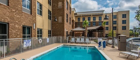 Enjoy lounging around the on-site outdoor pool.