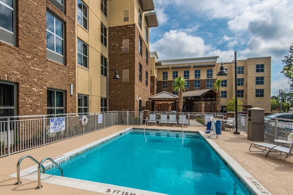 Enjoy lounging around the on-site outdoor pool.
