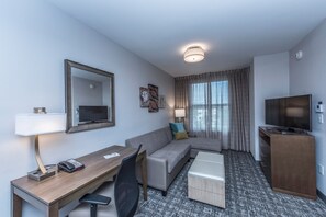 Sink into the cozy sofa after a day exploring the area.