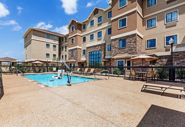 Relax around the outdoor pool.