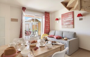 Sink into the cozy sofa after a day exploring the area.