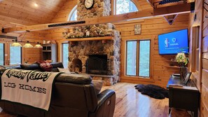 Living area with custom built wood fireplace 