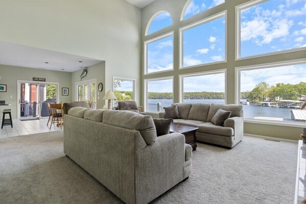 2 Story Living Room with big views of the lake.