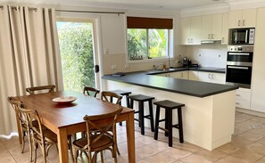 Fully Equipped Kitchen and Dining Area