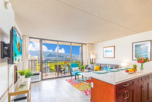 Living room with beautiful City and Mountain views