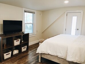 The bedroom also features a walk-out balcony with downtown and boardwalk views.