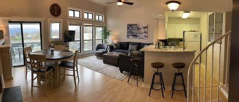 Lake and Mountain views from the dining area, living room, and kitchen.