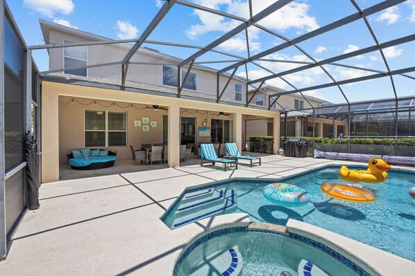 Pool with screen with lanai, seating for 16, string lights, fans 