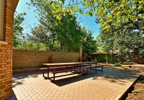 Enjoy outdoor dining in the courtyard by the butterfly garden. 