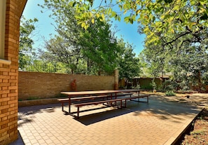 Enjoy outdoor dining in the courtyard by the butterfly garden. 