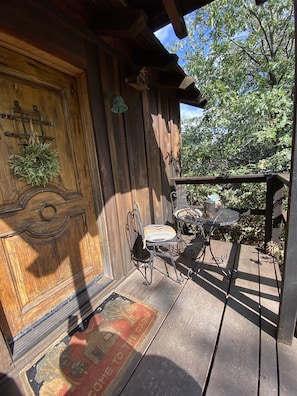 Front door with small patio area