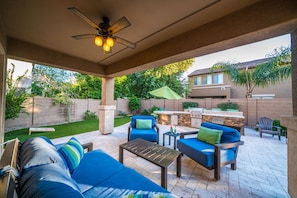 Covered Back Patio with Ceiling Fan & Mounted TV 