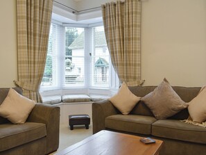 Comfortable seating within living area | West Lodge, Banchory