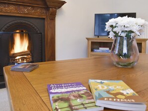 Welcoming living room with open fire | West Lodge, Banchory