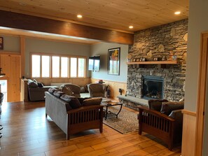 Great Room with gas fireplace and 2 separate seating areas
