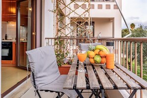 Indulge in relaxation on the expansive balcony of the house