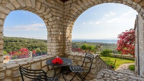 Delight in the charming view from the tower's balcony