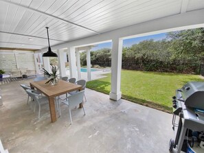 Outdoor Covered Dining Area with Grill