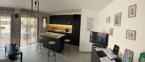 Vue dâensemble piĂšce principal appartement classĂ© 3 Ă©toiles .