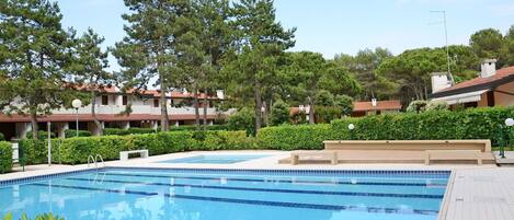 Water, Plant, Cloud, Sky, Swimming Pool, Azure, Tree, Building, Rectangle, Outdoor Furniture