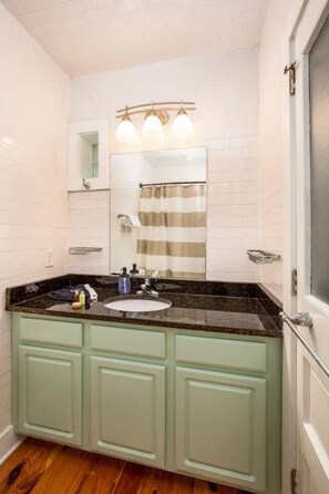 Full bathroom #1 with a walk-in shower. Fresh towels, hairdryers and amenities provided