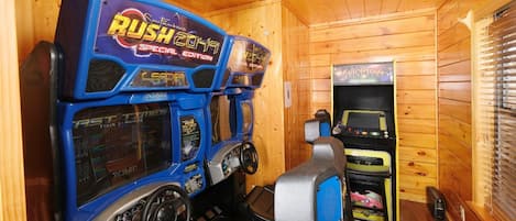 Fun-packed game room with arcade classics for endless entertainment.