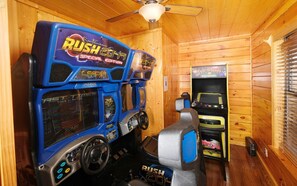Fun-packed game room with arcade classics for endless entertainment.
