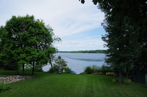 Excellent elevated view from the back deck towards the lawn and lake.