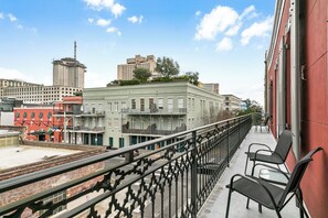 WOW! Corner balcony that wraps around the building. Perfect for morning and evening gatherings outside while never leaving home!