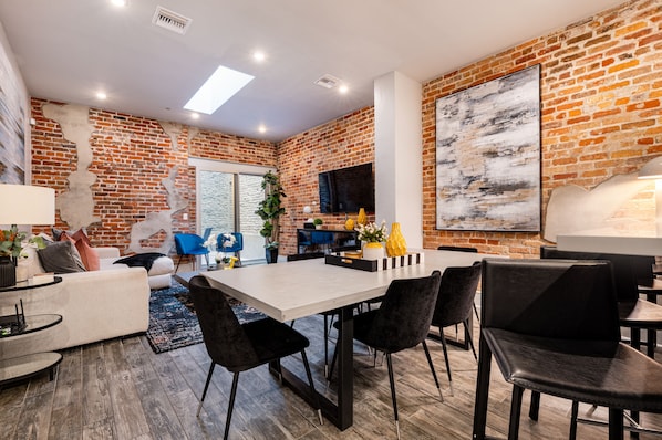 Open concept living, kitchen, and dining area with ample comfortable seating options for you and your guests. Samsung Smart 4K TV that allows for streaming from your favorite apps, along with the DIRECTV Entertainment.