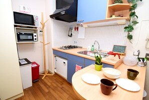 Enjoy cooking! Toaster, microwave, refrigerator and kitchen.