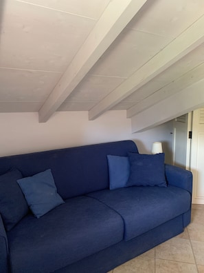 Sofa bed in the attic