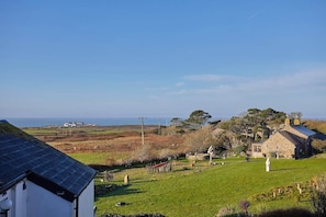 Stunning countryside and distance sea views from the living room window!