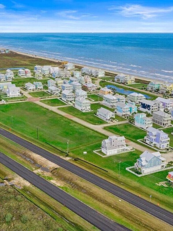 This home is minutes from the Seawall and steps away from the beach