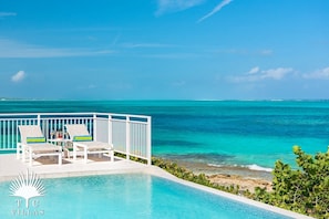 Sandstone's private pool is equipped with loungers, BBQ, and outdoor dining.