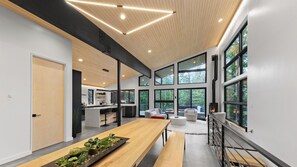 RAVN HAUS - Canopy - Dining Room Living Room Modern Fireplace Kitchen _ VRBO