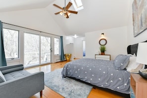 This pool side bedroom has queen size bed for an elegant retreat.