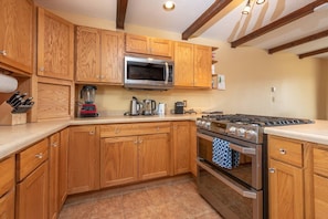 Fully equipped kitchen to whip up a meal for family and friends.