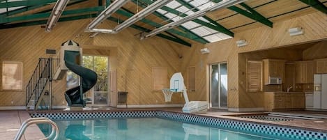 Amazing Indoor Pool with slide, basketball hoop, Jacuzzi, kitchen, diving board