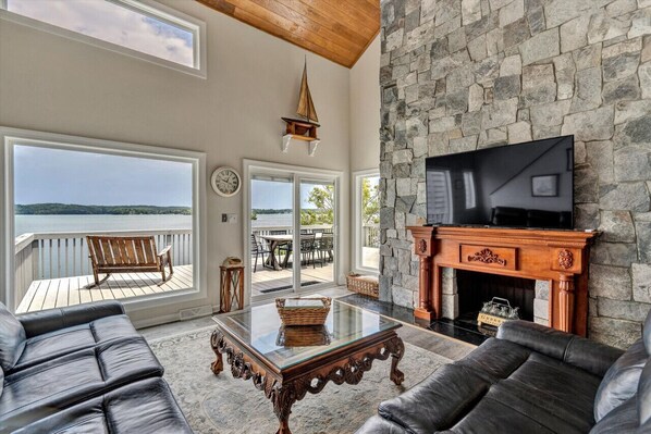 Kick back in the inviting living room with a large-screen TV and stylish décor.