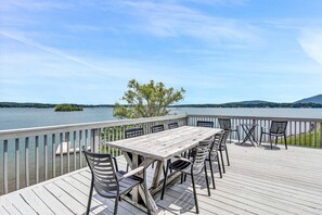 The expansive deck offers a great spot for outdoor dining and soaking up the sun.