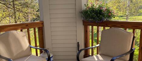 Relax on the deck overlooking the first hole on Haystack Golf Course