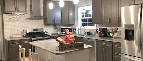 Brand New remodel Kitchen, with slow closing cabinets and Marble Countertops