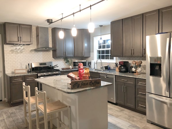 Brand New remodel Kitchen, with slow closing cabinets and Marble Countertops