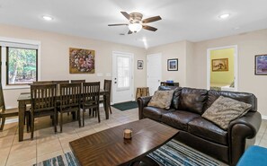 Looking toward the dining and living areas from the kitchenette of Woodland Pines Cottage