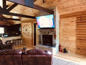 Living room with 65" curved smart TV