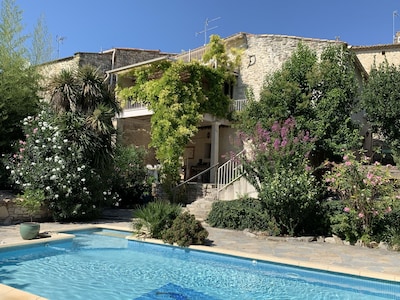 18th century village stone house, beautiful views, swimming pool, near Uzès