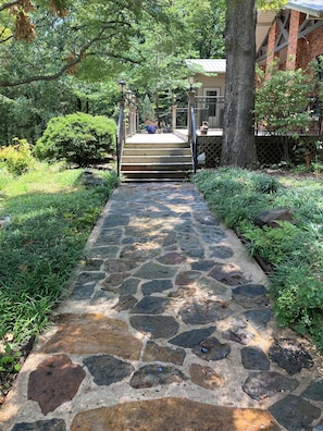 Front pathway leading to front porch.
Key code lock box located on step post.