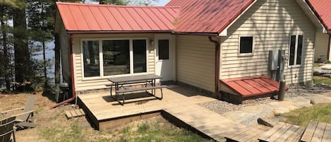 External view of cabin with picnic table